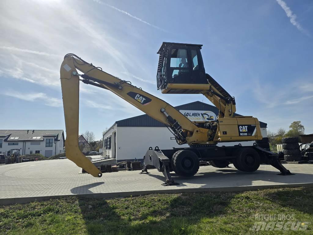 CAT 318D Atliekų / pramoniniai krautuvai