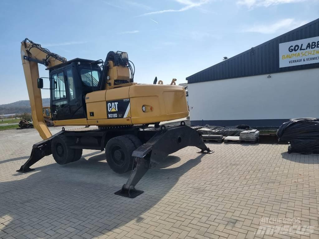 CAT 318D Atliekų / pramoniniai krautuvai