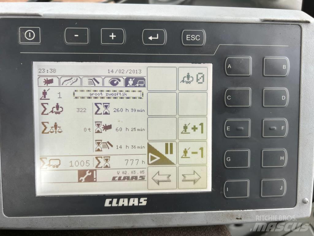 CLAAS Cargos 8500 Savikrovės priekabos