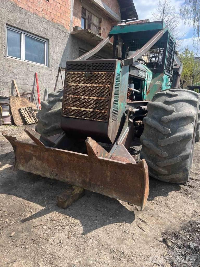 Timberjack 450C Skiedrovežiai