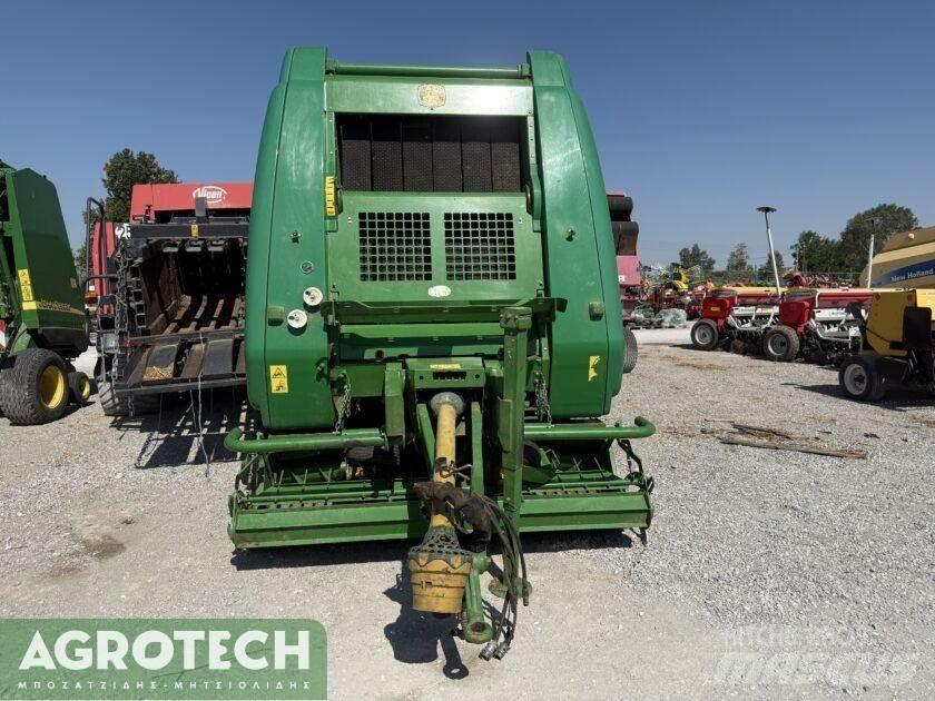 John Deere 864 Ritinių presai