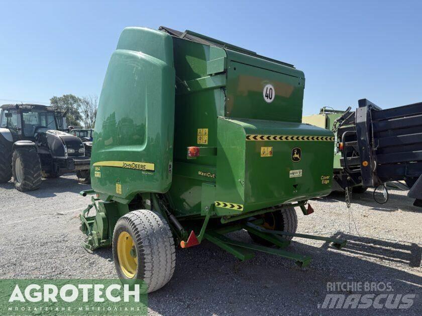 John Deere 864 Ritinių presai