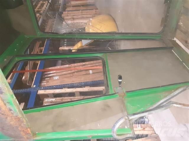 John Deere 955 Kabinos