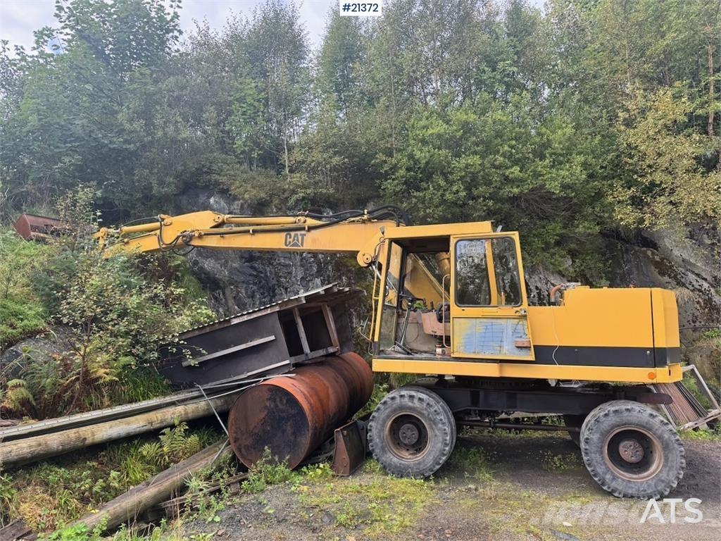 CAT 212B Ratiniai ekskavatoriai