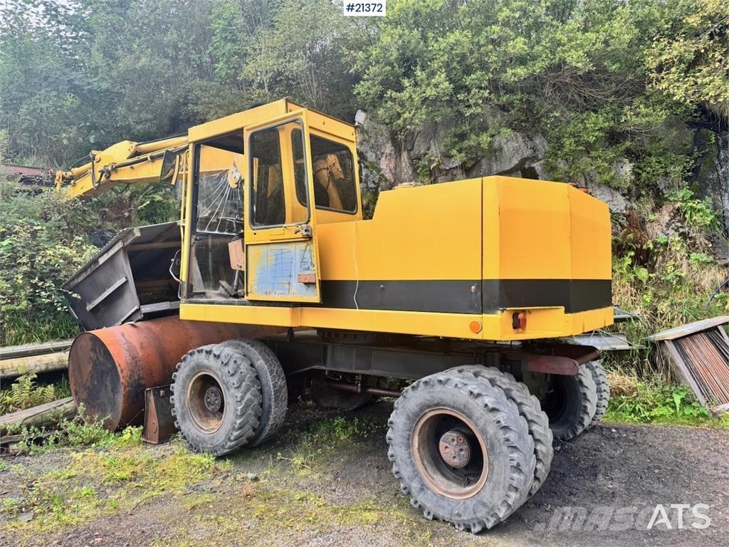 CAT 212B Ratiniai ekskavatoriai