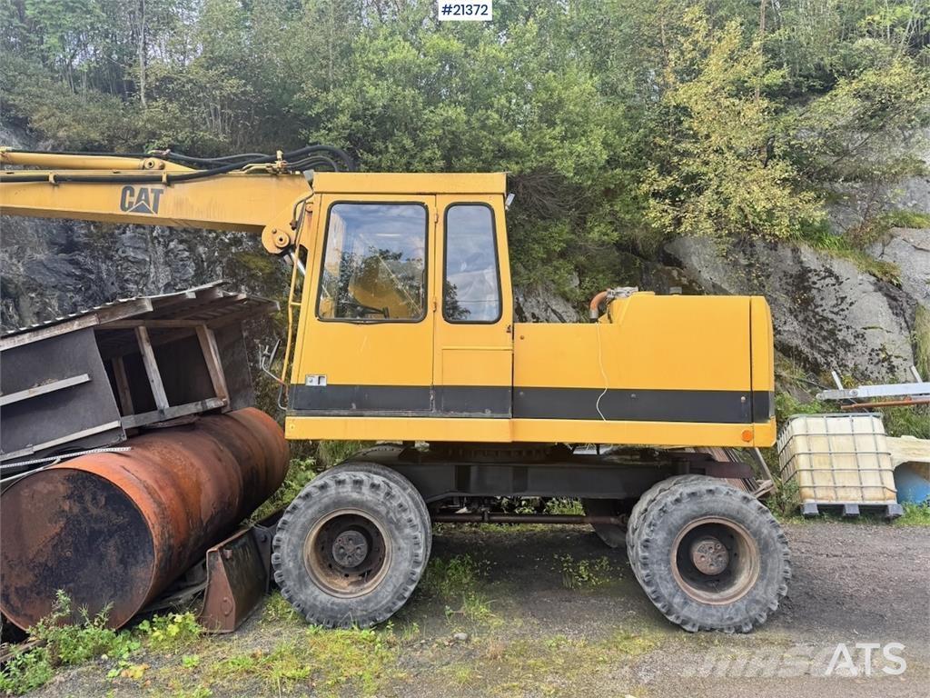 CAT 212B Ratiniai ekskavatoriai