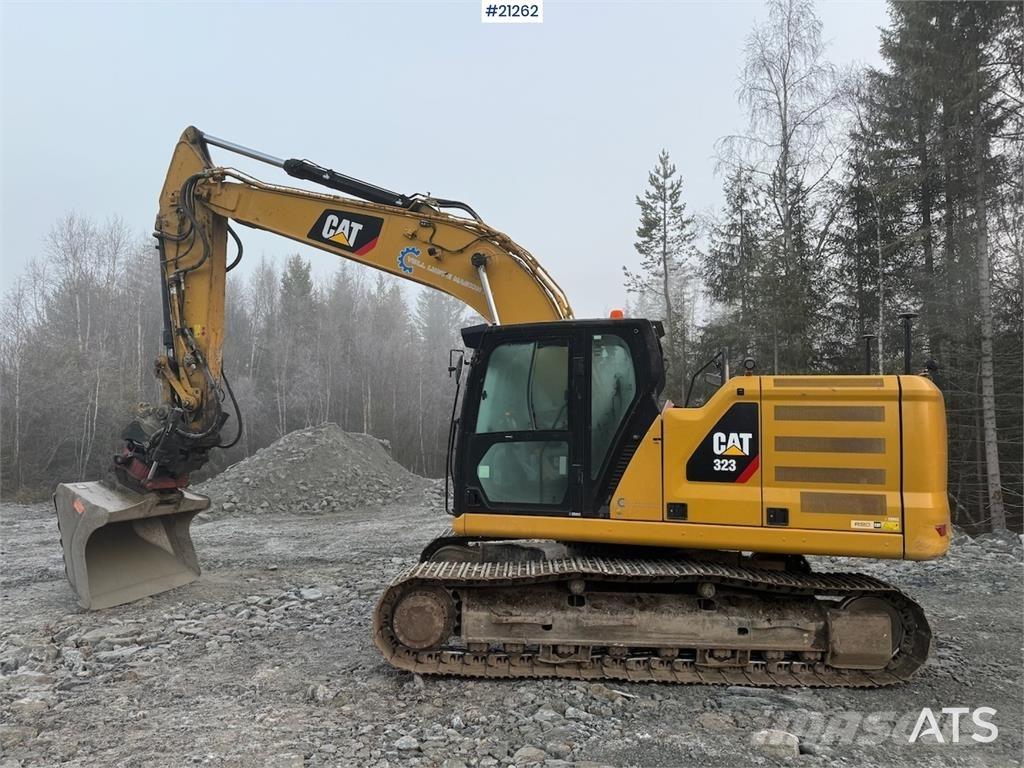 CAT 323 Vikšriniai ekskavatoriai