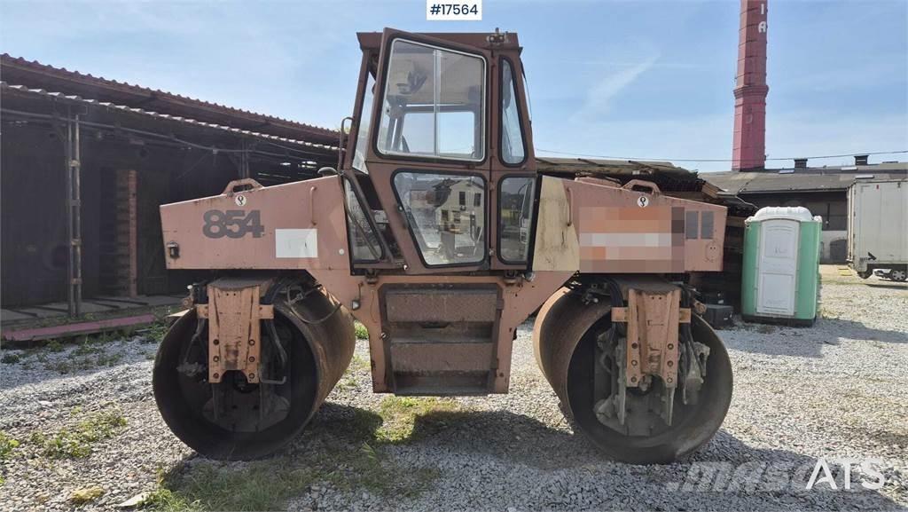 CASE Vibromax W 854 Porinių būgnų volai