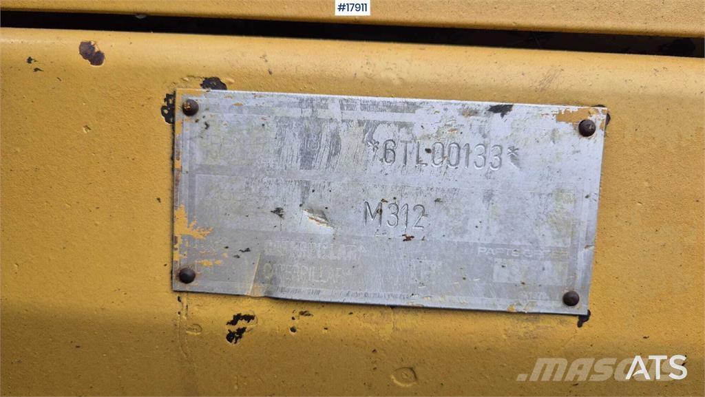 CAT M312 Ratiniai ekskavatoriai