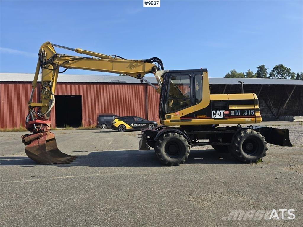 CAT M315 Ratiniai ekskavatoriai