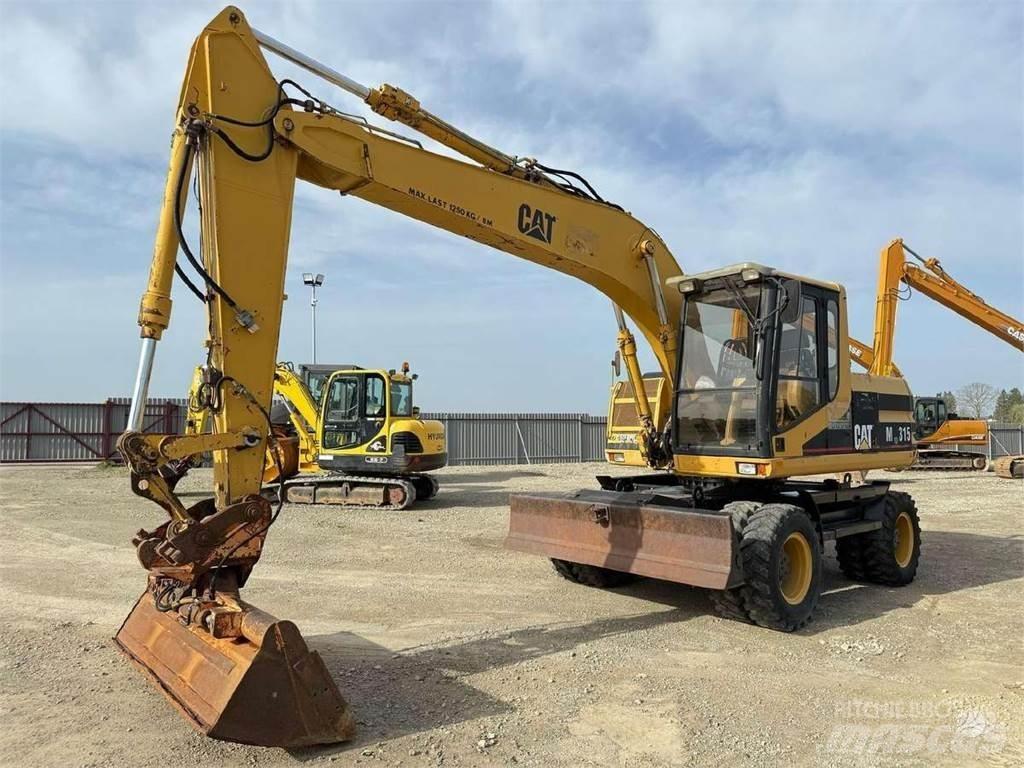 CAT M 315 Ratiniai ekskavatoriai