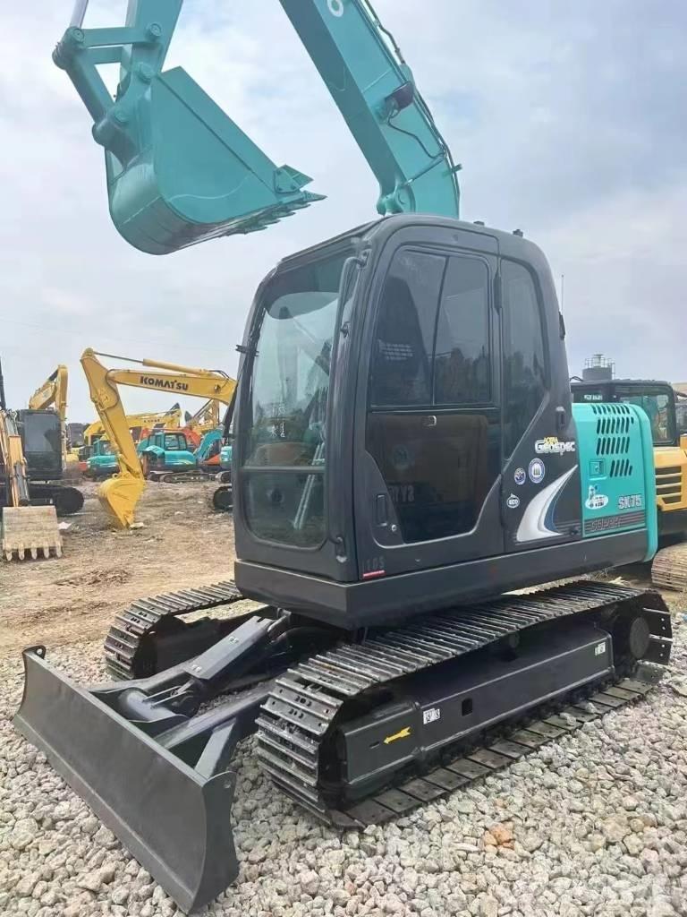 Kobelco SK 75 Vidutinės galios ekskavatoriai 7-12 t