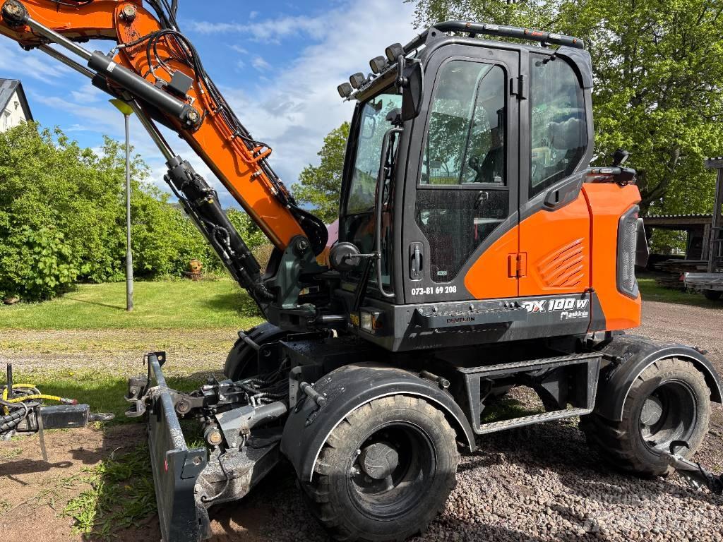 Develon DX 100 W-7 Ratiniai ekskavatoriai