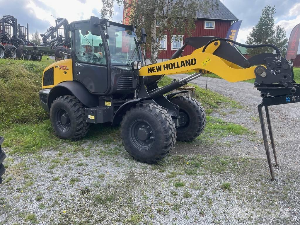 New Holland W70C Naudoti ratiniai krautuvai