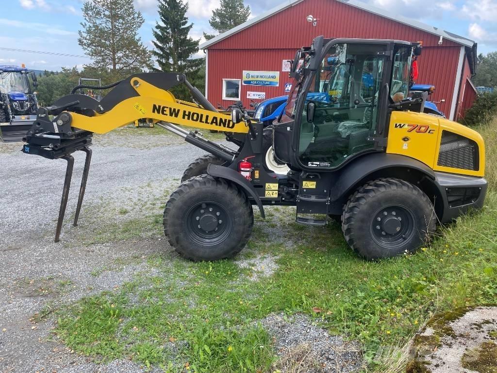 New Holland W70C Naudoti ratiniai krautuvai