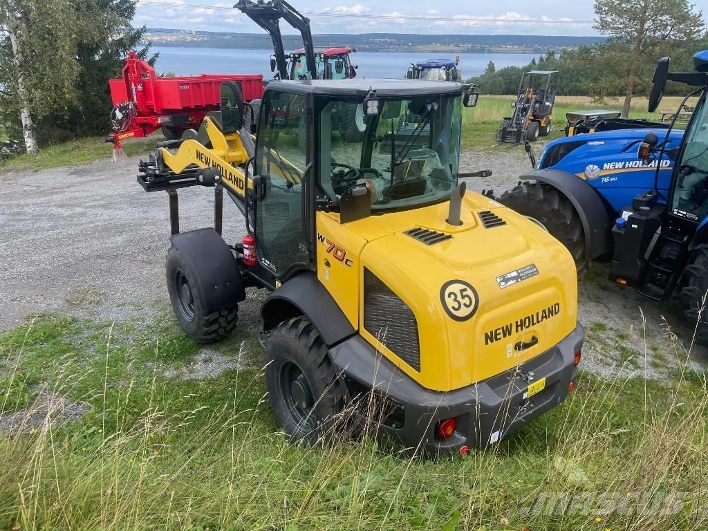 New Holland W70C Naudoti ratiniai krautuvai
