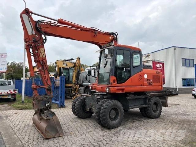 Komatsu PW 160 - 7EO Ratiniai ekskavatoriai