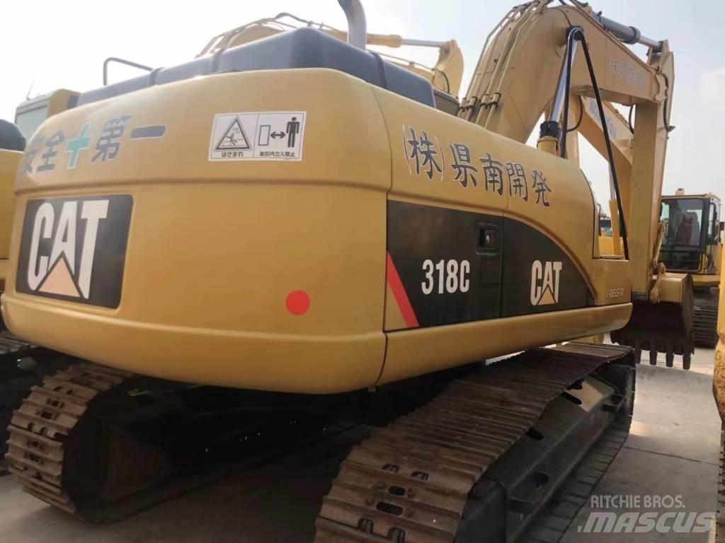 CAT 318C Vikšriniai ekskavatoriai