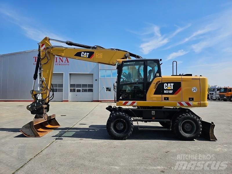 CAT M 318 F Ratiniai ekskavatoriai