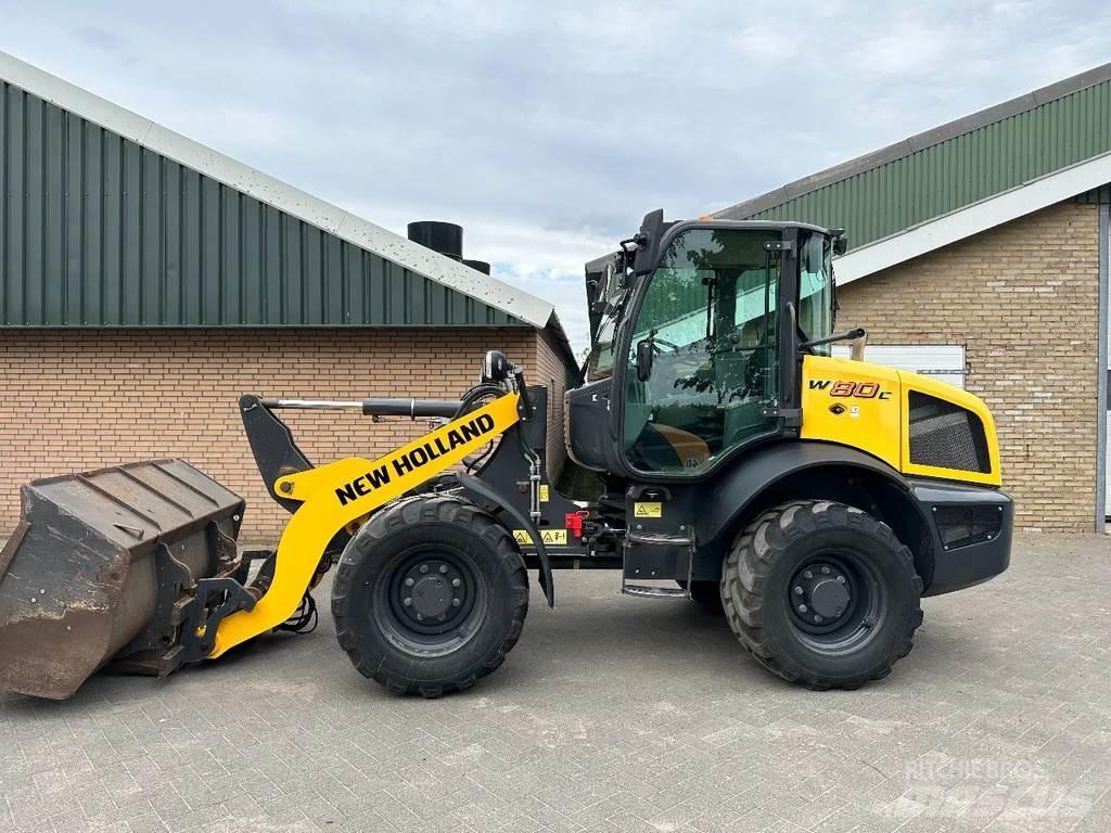New Holland W80C Naudoti ratiniai krautuvai
