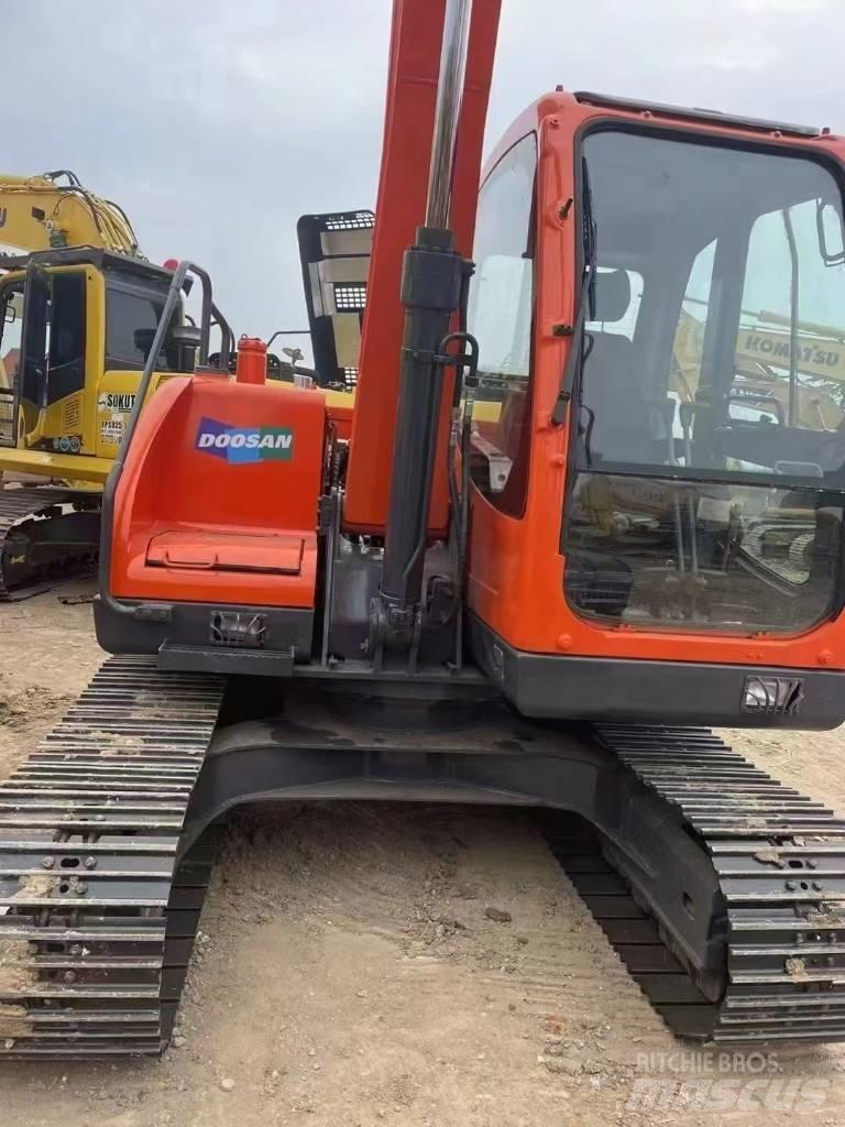 Doosan DX 80 Vidutinės galios ekskavatoriai 7-12 t