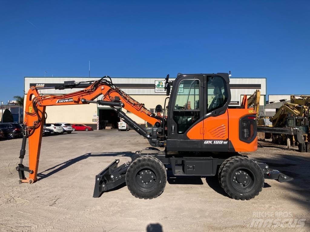 Develon DX 100 W-7 Ratiniai ekskavatoriai