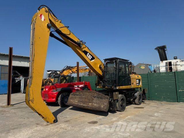 CAT 318D MH Krovimas/Kėlimas - Kita