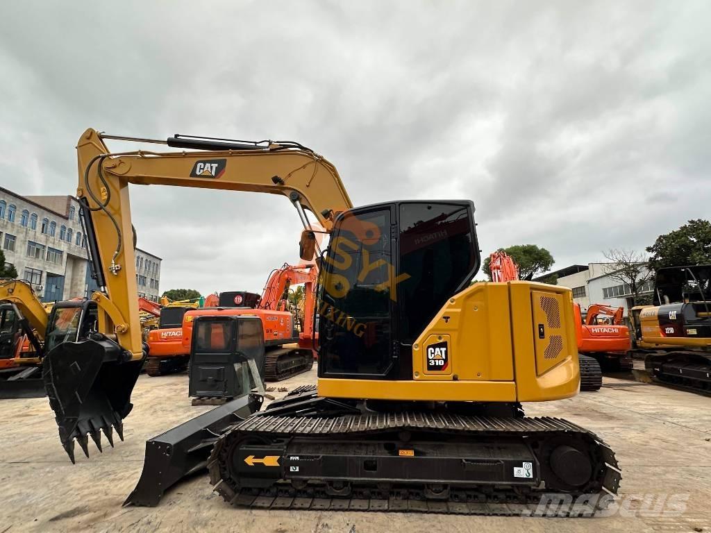 CAT 310 Vikšriniai ekskavatoriai