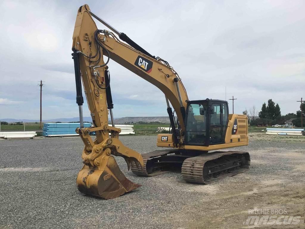 CAT 323 Vikšriniai ekskavatoriai