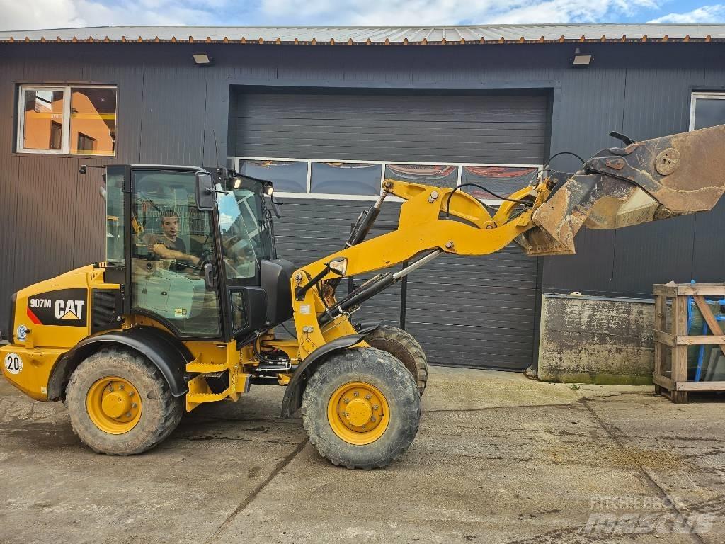CAT 907M Naudoti ratiniai krautuvai