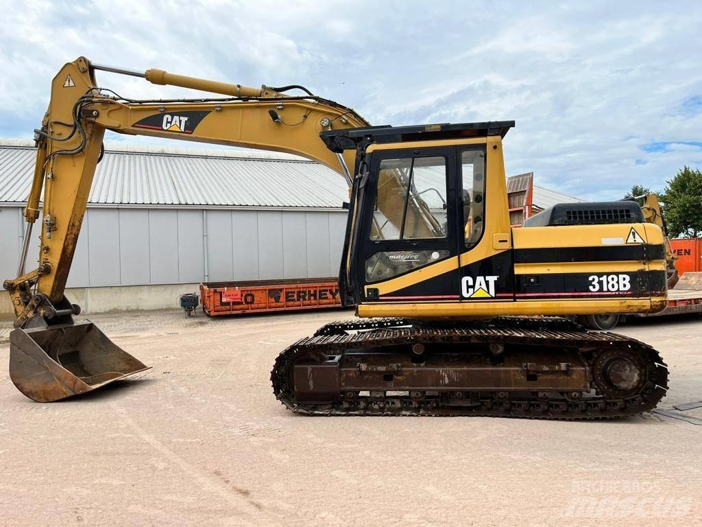 CAT 318BL Vikšriniai ekskavatoriai