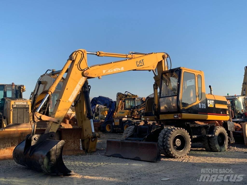 CAT M 315 Ratiniai ekskavatoriai