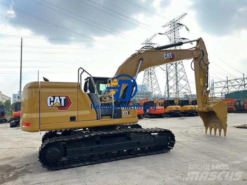 CAT 323GC Vikšriniai ekskavatoriai