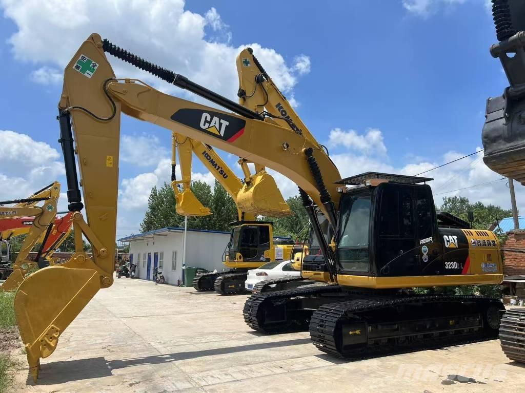 CAT 323DL Vikšriniai ekskavatoriai