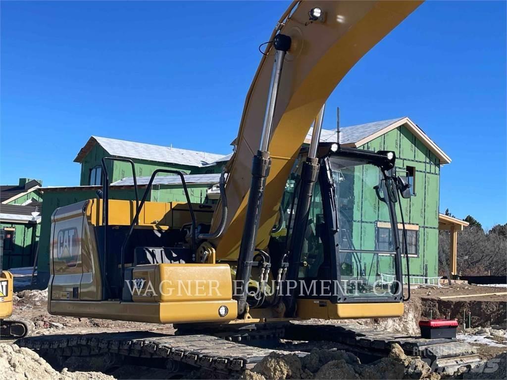 CAT 323 Vikšriniai ekskavatoriai