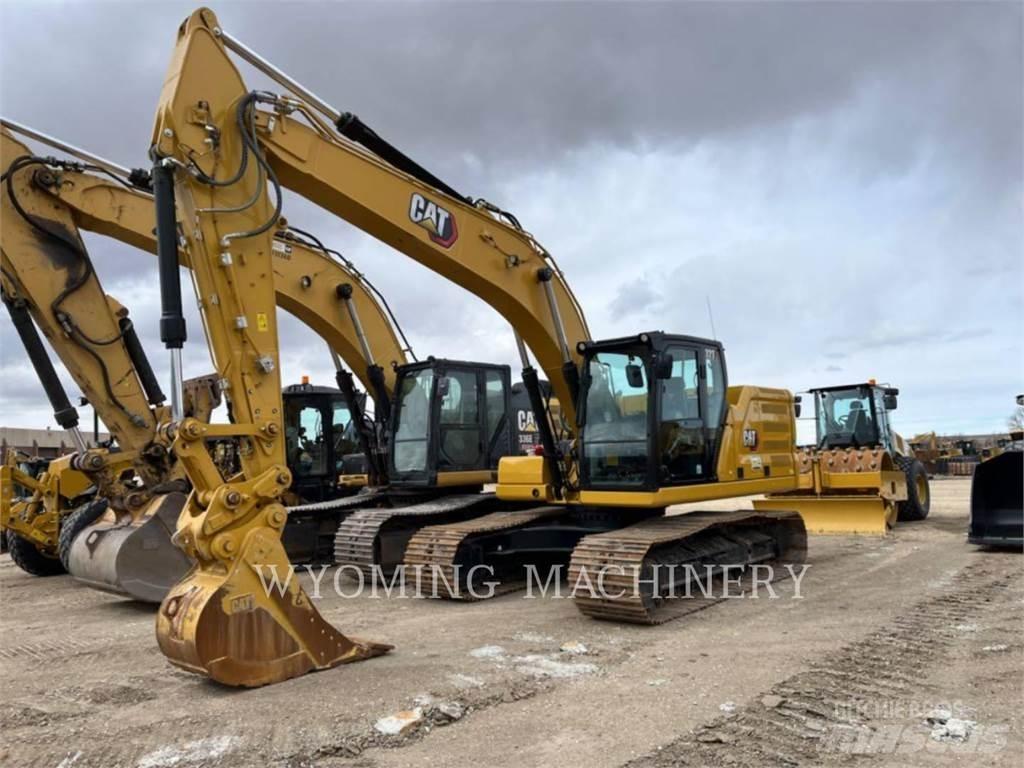 CAT 323 Vikšriniai ekskavatoriai
