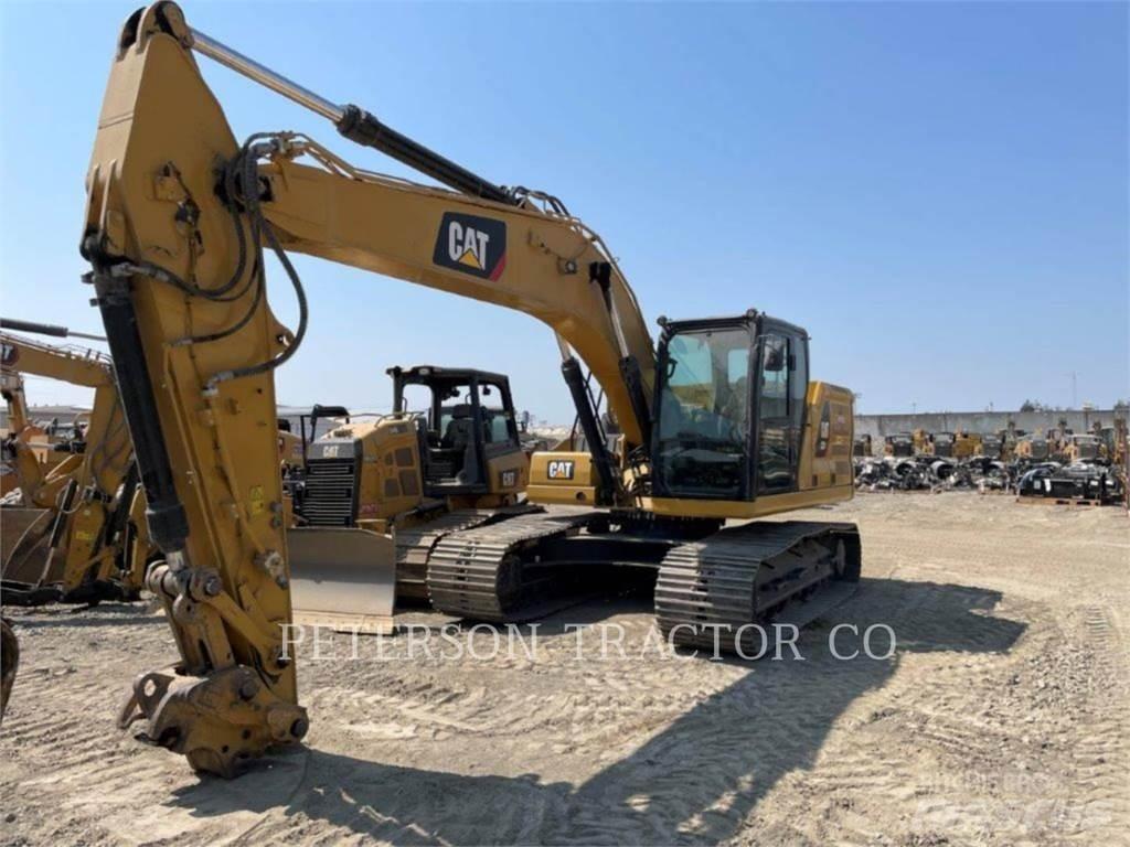 CAT 323 Vikšriniai ekskavatoriai