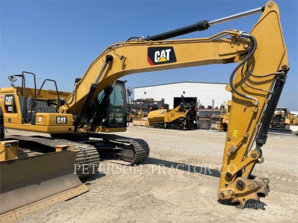 CAT 323 Vikšriniai ekskavatoriai