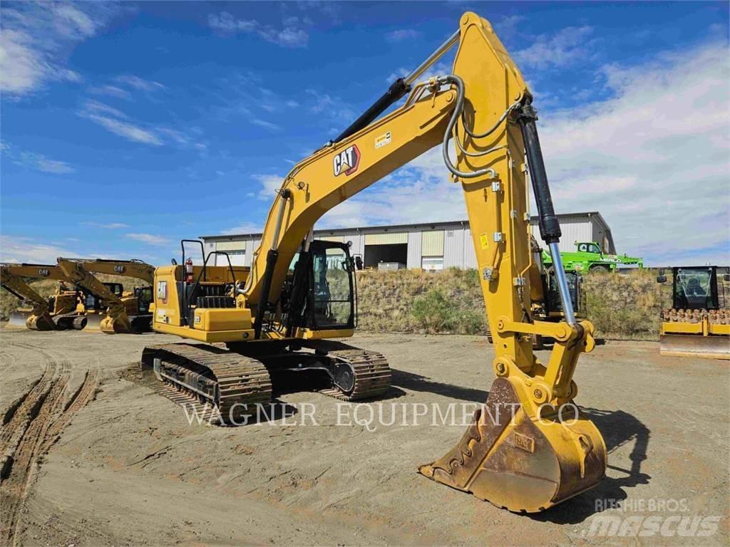 CAT 323 Vikšriniai ekskavatoriai