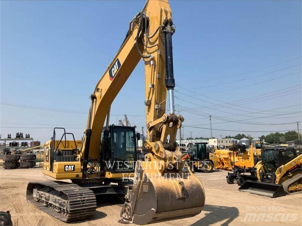 CAT 323 Vikšriniai ekskavatoriai