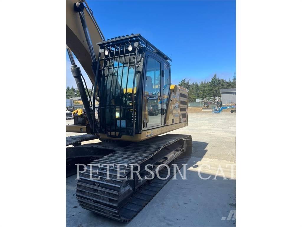 CAT 323 Vikšriniai ekskavatoriai