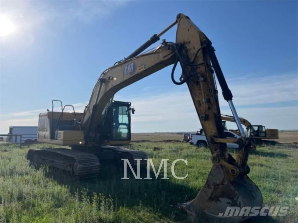CAT 323 Vikšriniai ekskavatoriai