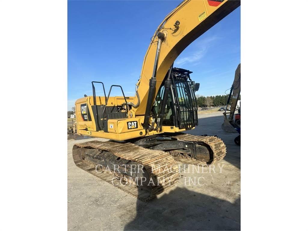 CAT 323 TC Vikšriniai ekskavatoriai