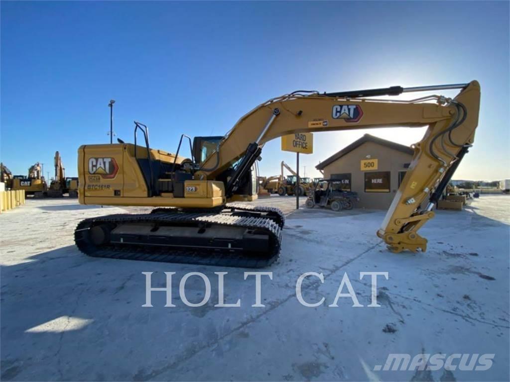 CAT 323 TC Vikšriniai ekskavatoriai
