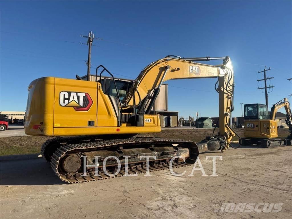 CAT 323 TC Vikšriniai ekskavatoriai