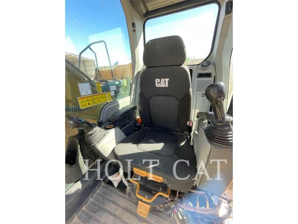 CAT 323 TC Vikšriniai ekskavatoriai