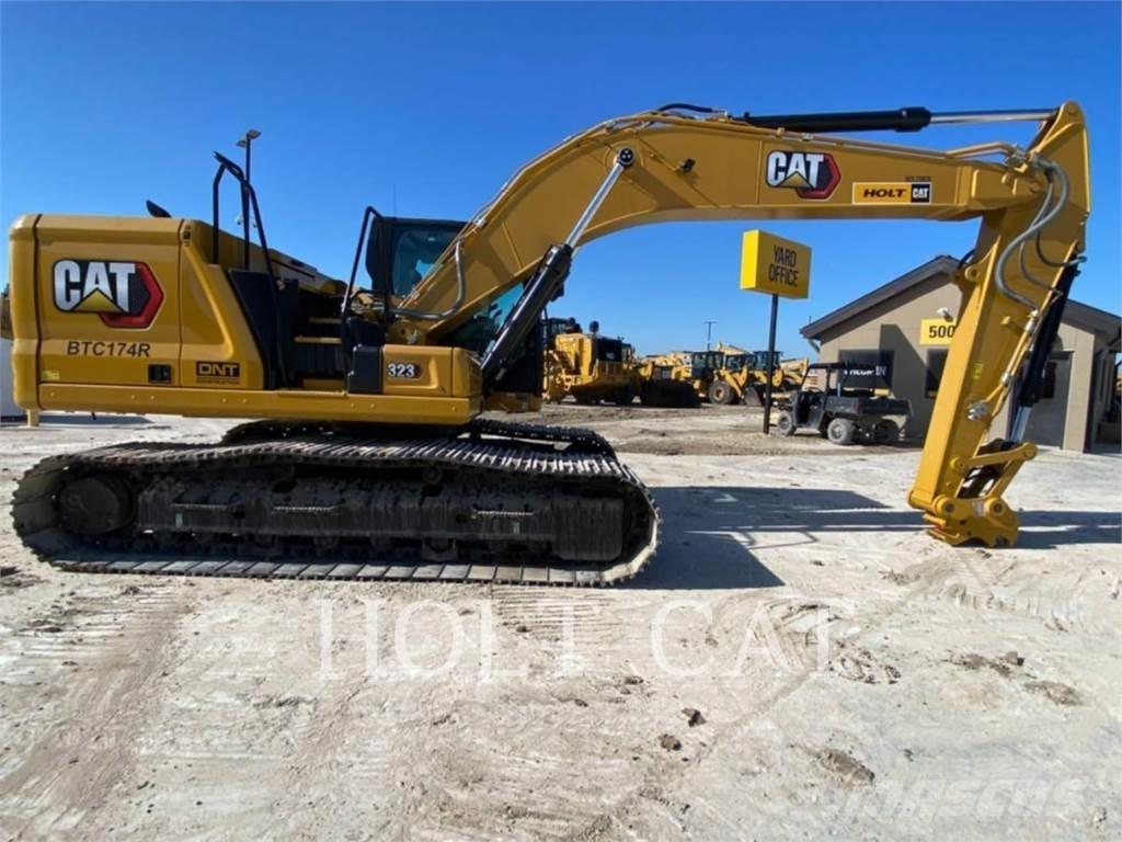 CAT 323 TC Vikšriniai ekskavatoriai