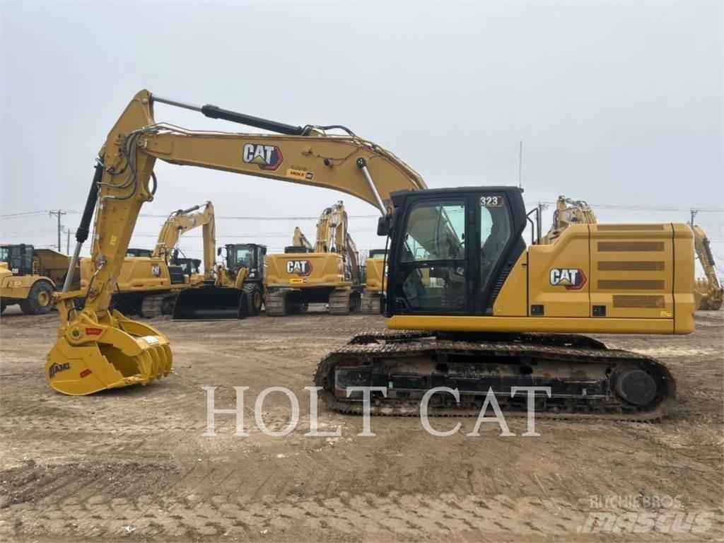 CAT 323 TC Vikšriniai ekskavatoriai