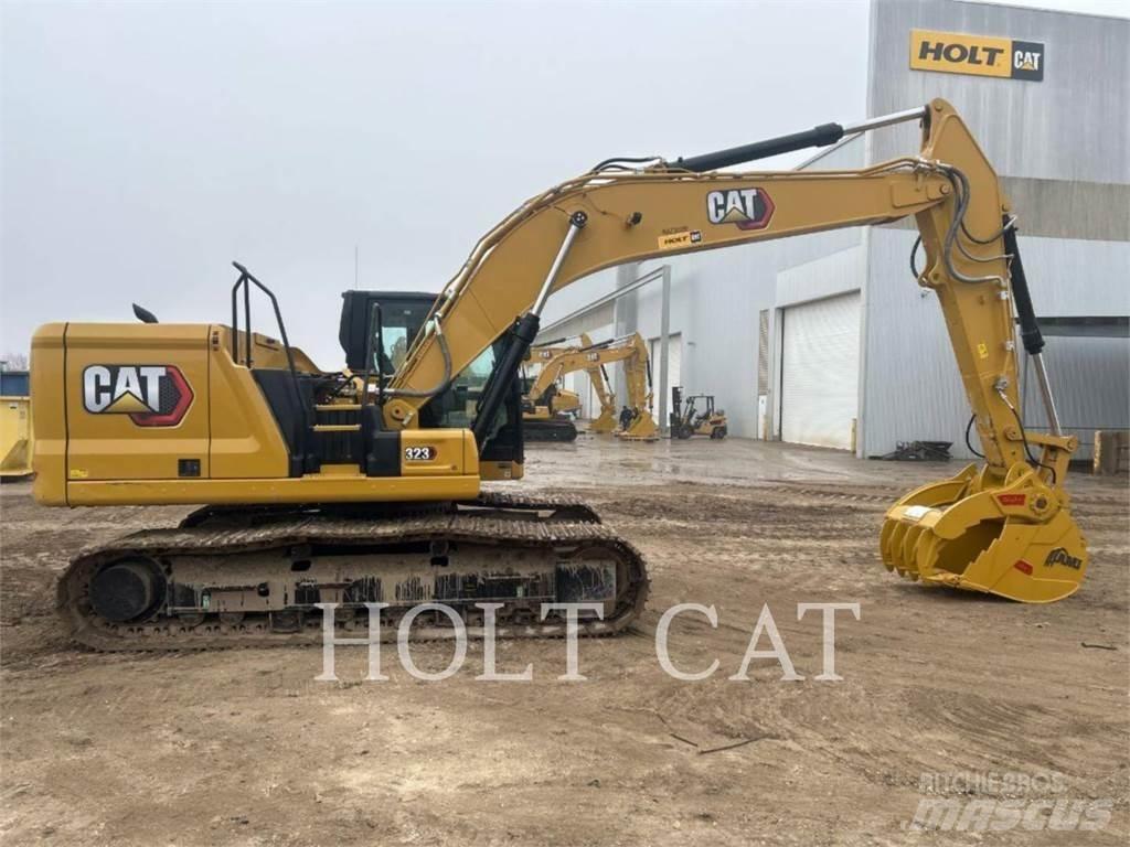 CAT 323 TC Vikšriniai ekskavatoriai