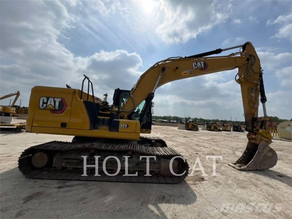 CAT 323 TC Vikšriniai ekskavatoriai